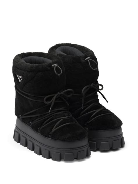 prada vrille|Prada shearling boots.